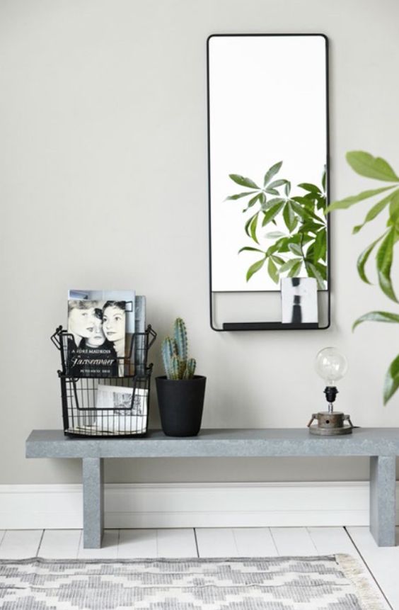 decorar-un-recibidor-pequeño-banco